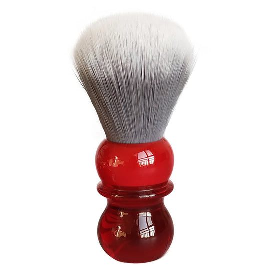 Shaving brush with soft bristles and a red resin handle